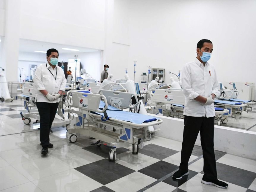 Indonesian President Joko Widodo inspects medical equipment at a new hospital in Jakarta.