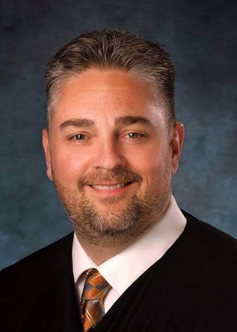 David Gibson, Jr., who was a hearing master, awarded Aaron to his father, Paul Jones, despite r ...