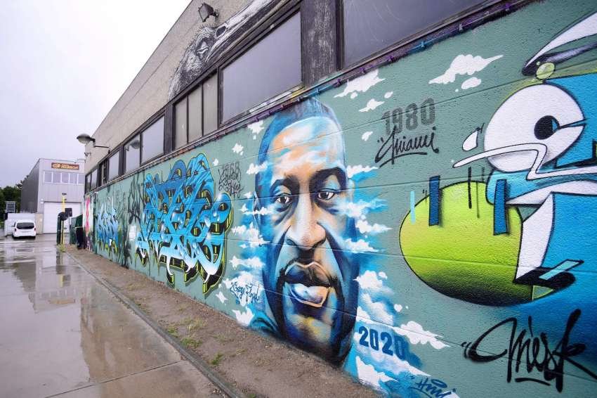 This mural, taken June 5 along Nijverheidslaan street in Strombeek-Bever, shows a graffiti by artist Djamel Oulkadi.