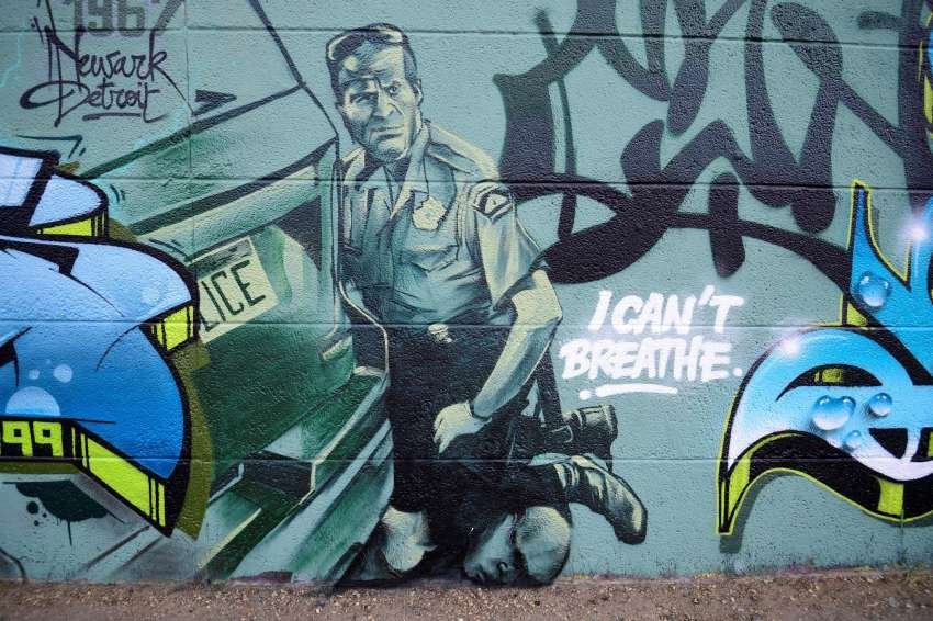 This mural, taken June 5 along Nijverheidslaan street in Strombeek-Bever, shows a graffiti by artist Djamel Oulkadi.