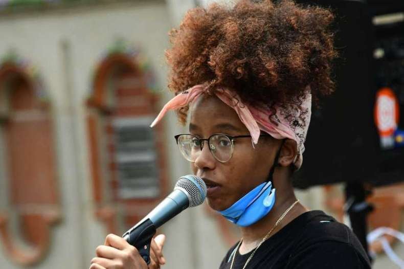 Alicia Clemente-Delrow of Albany speaks as demonstrators gather in Washington Park for a daily rally against police brutality on Friday, June 5, 2020 in Albany, N.Y. (Lori Van Buren/Times Union)