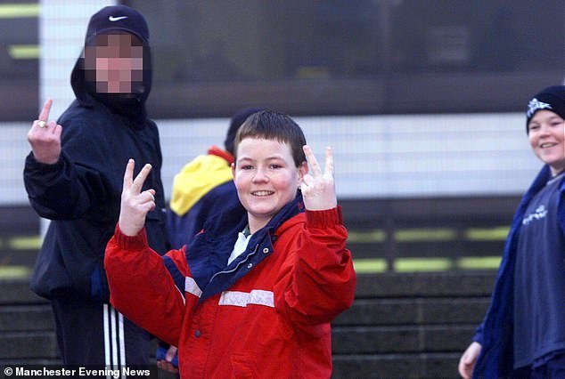 When the boys were finally banned from the estate the following year, takings at the local shops increased by £14,000 a week. Sean McCann is pictured (centre) in Manchester in 1999