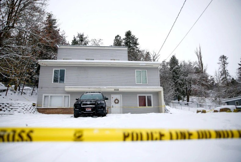 Moscow Police monitor the residence where four University of Idaho students were killed in Moscow, Idaho, on Nov. 30, 2022. 
