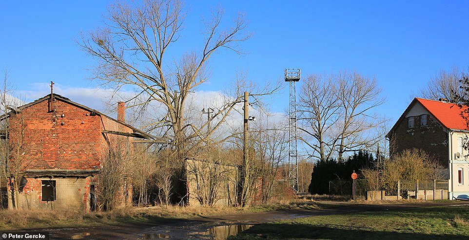 It is not clear if the paedophile owned the abandoned box factory or part of it - but he is known to have been living there in a caravan behind its gates