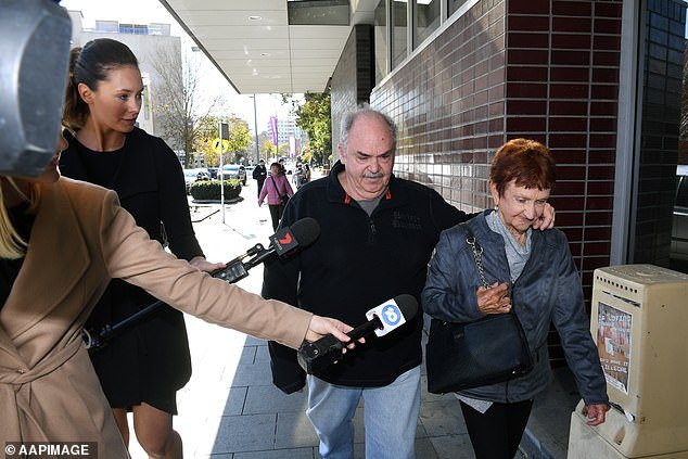 Ms Young's father and grandmother outside Bankstown Local Court on Monday morning