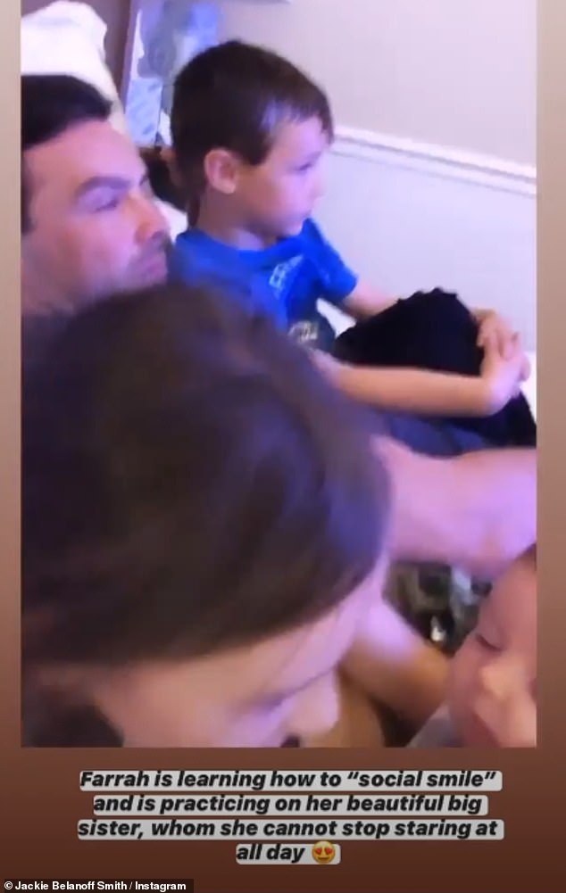 Together: As the girls bonded, Ben and his son watched TV during their long-awaited reunion