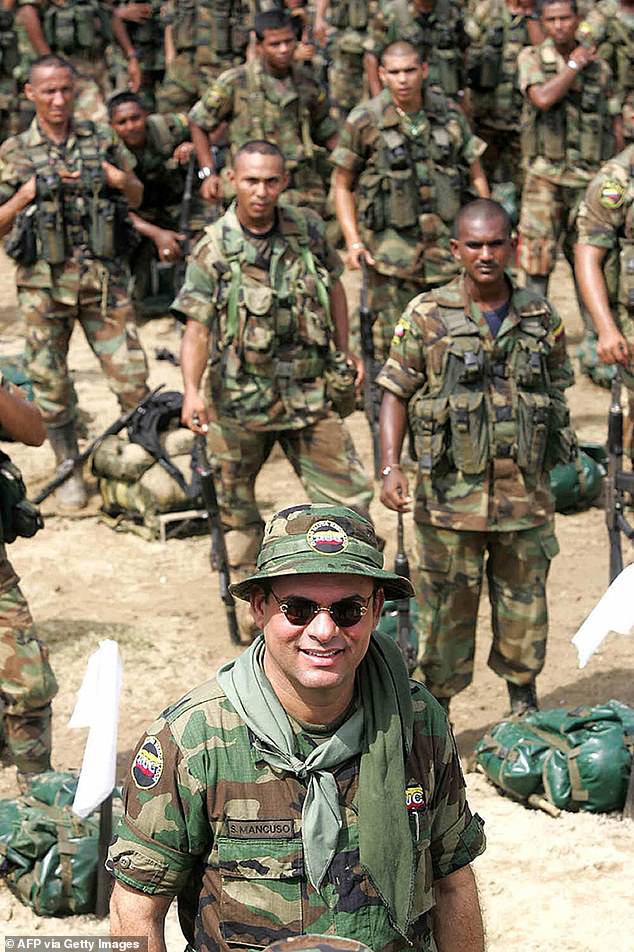 Salvatore Mancuso pictured in December 10, 2004 as 1,425 members of the Colombian United Self Defense demobilized as part of the country's peace agreement
