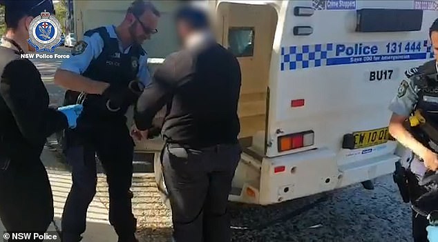 The teacher (pictured) was arrested at the elite private school in Sydney's inner west on Thursday