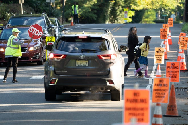 Students who live between 1 and 2 miles from the school they attend will not be provided with courtesy busing to and from school. Students and parents arrive for the first day of school at Delia Bolden Elementary School in Maplewood, N.J. on Thursday Sept. 8, 2022. 