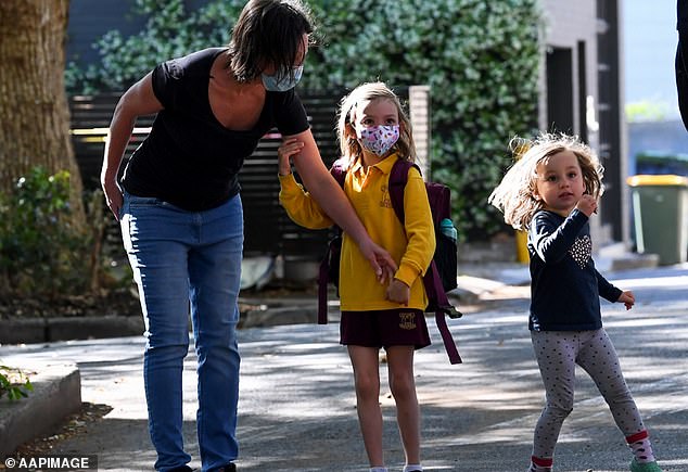 While students at impacted school don't have to wear masks, they're 'strongly recommended