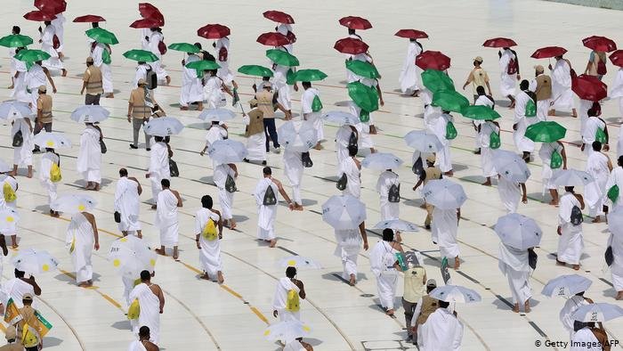 Pilgrims circumambulating around the Kaaba, Islam's holiest shrine, at the centre of the Grand Mosque in the holy city of Mecca Pilgrims circumambulating around the Kaaba, Islam's holiest shrine, at the centre of the Grand Mosque in the holy city of Mecca