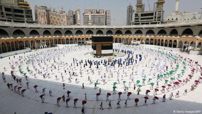Wide shot of pilgrims circumambulating around the Kaaba, Islam's holiest shrine Wide shot of pilgrims circumambulating around the Kaaba, Islam's holiest shrine
