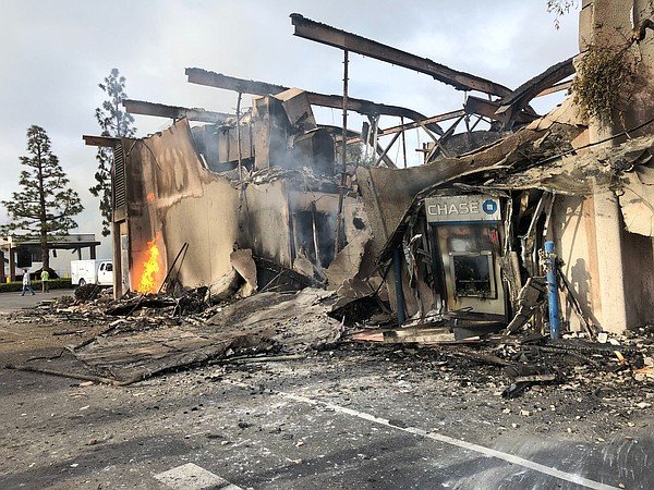 Small flames still burn at Chase bank location on Spring ...