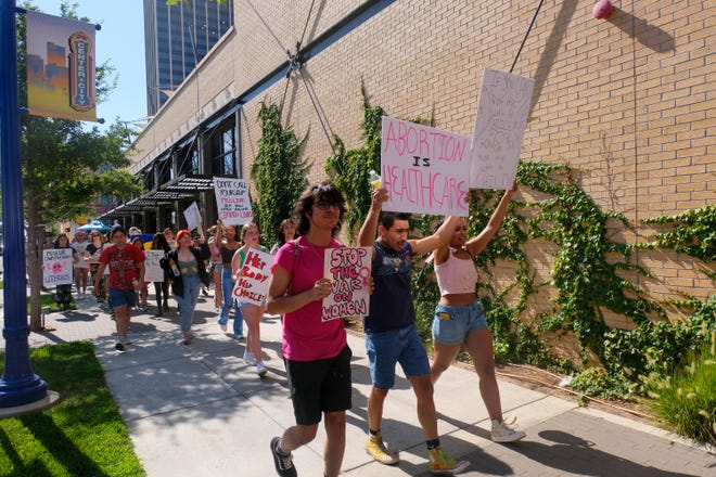 About 65 protesters march in July in downtown Amarillo in response to the Supreme Court Decision overturning Roe versus Wade.